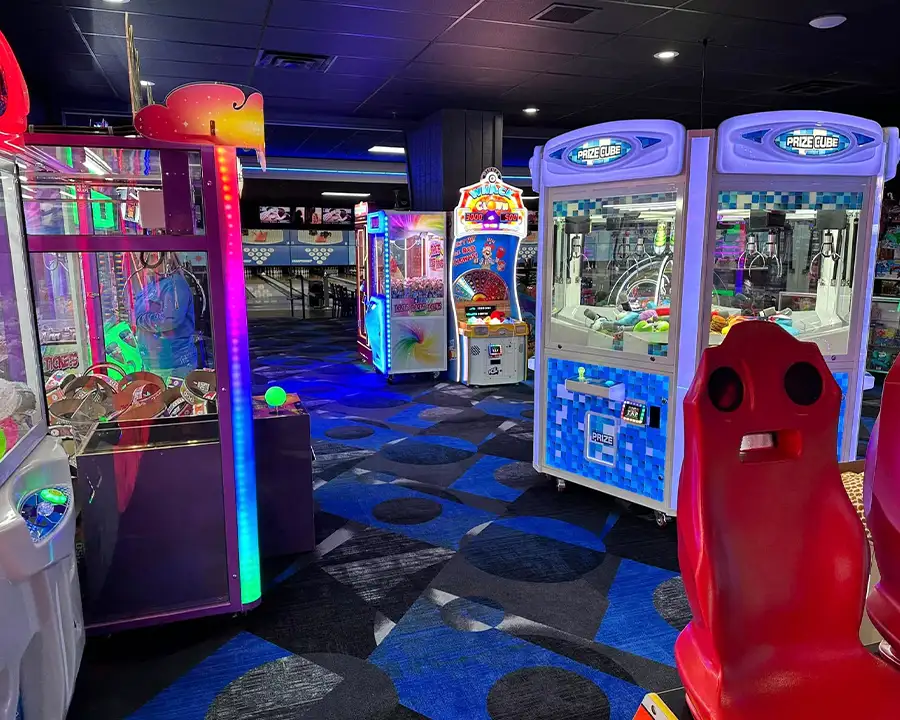 Colorful arcade games and prize machines at Championship Lanes in Anderson, IN