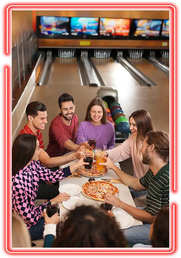 Large Group of friends sharing pizza and drinks before bowling at Championship Lanes in Anderson, IN - Ultimate Unlimited Parties